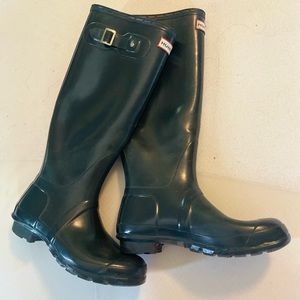 Women’s Hunter rainboots (weathered condition). Functionally fine, faded color.